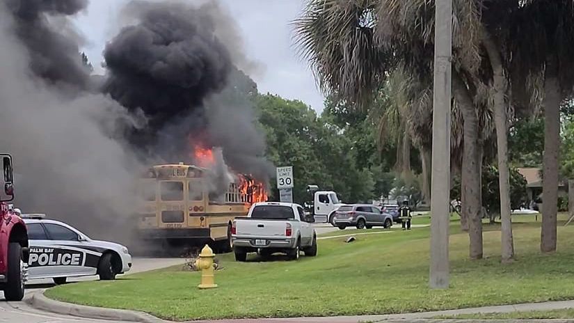 Emergency personnel in Brevard County respond to a school bus fire Tuesday in the area of Tilberg Avenue and Umber Street. (Photo courtesy of Sean Putira)