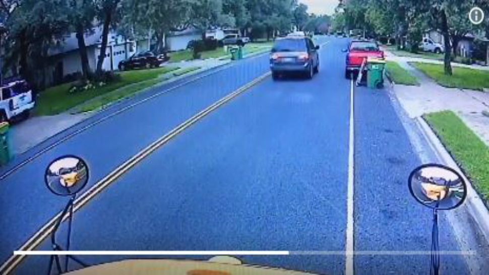 Surveillance video captured an SUV sideswiping a school bus in Cedar Park, Texas, in this image from Sept. 24, 2018. (Williamson County Sheriff's Office)