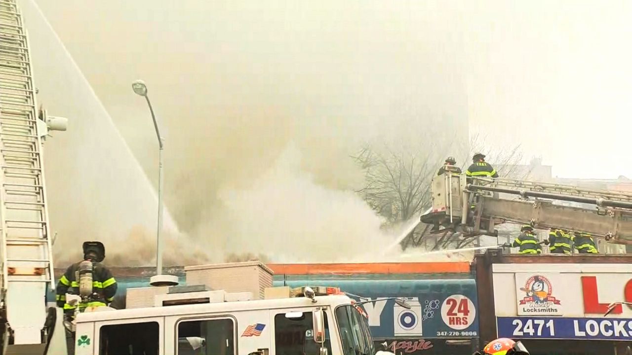 Firefighters Battle 4 Alarm Fire At Bronx Laundromat
