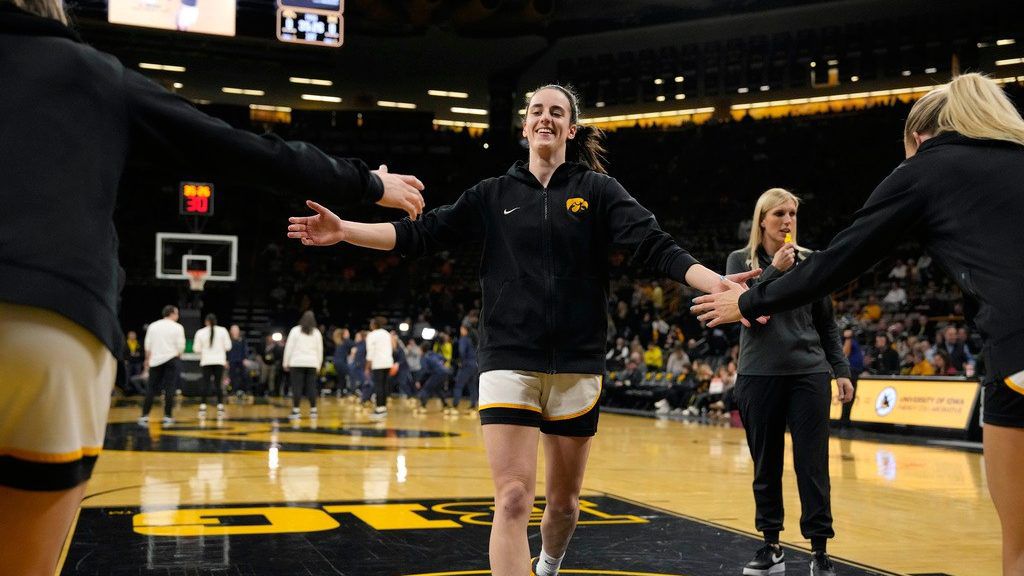 Iowa guard Caitlin Clark warms up for the team's NCAA college basketball game against Michigan, Thursday, Feb. 15, 2024, in Iowa City, Iowa. (AP Photo/Matthew Putney)