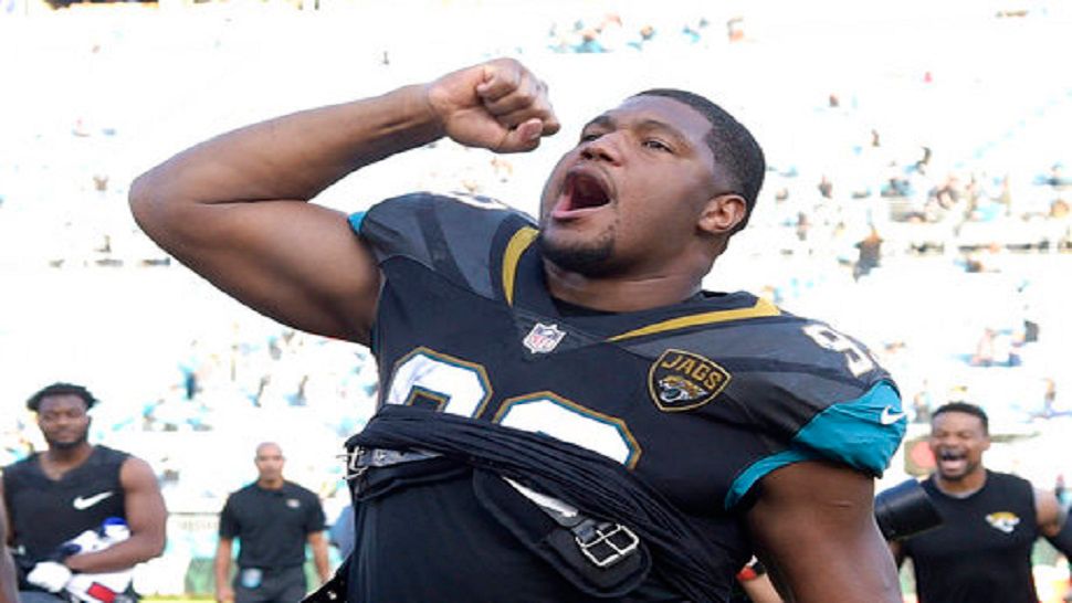 Jacksonville Jaguars defensive lineman Calais Campbell celebrating after an NFL football game against the Houston Texans in Jacksonville, Fla. (AP Photo/Phelan M. Ebenhack)