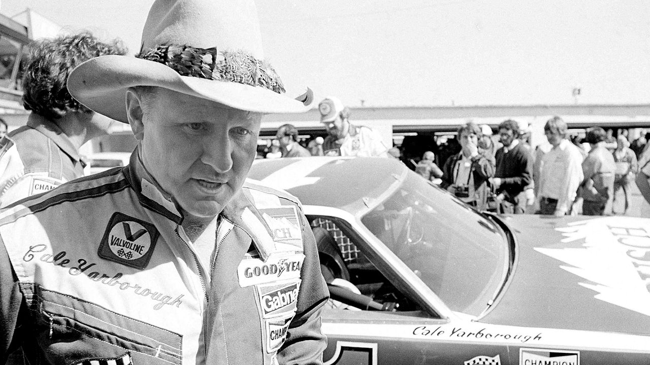 Cale Yarborough walks away after blowing the engine of his Oldsmobile after completing his first lap in pole position qualifying for the Daytona 500 in Daytona Beach, Fla., Feb. 11, 1979. Yarborough died Sunday, Dec. 31, 2023, at 84. (AP file photo/Hal Moore)