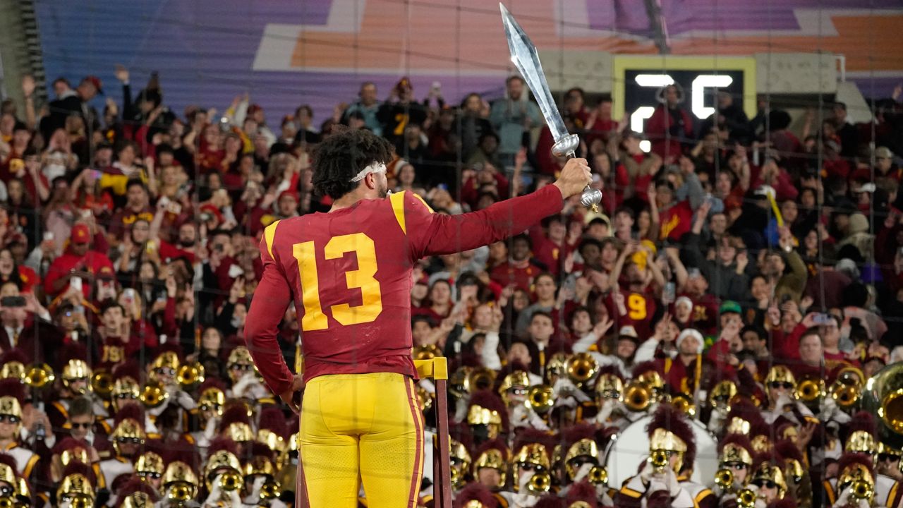 Southern California quarterback Caleb Williams leads the USC Marching Band after USC defeat UCLA 48-45 in an NCAA college football game Saturday, Nov. 19, 2022, in Pasadena, Calif. (AP Photo/Mark J. Terrill)