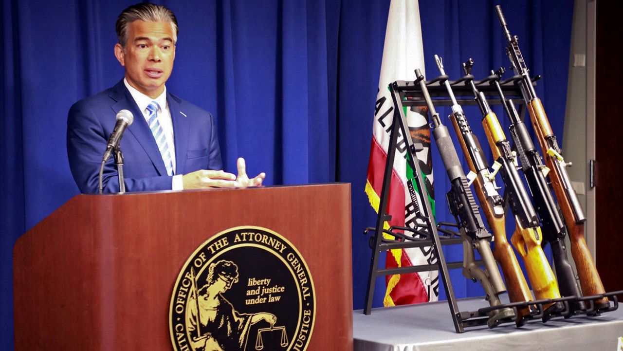 In this photo released by the California Department of Justice, state Attorney General Rob Bonta talks about the Armed and Prohibited Persons System, known as APPS, during a news conference in Sacramento, Calif., Wednesday, March 30, 2022. (California Department of Justice via AP)