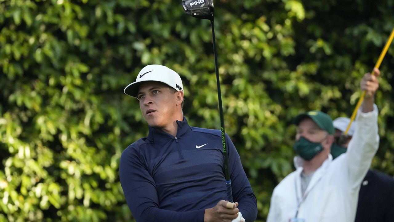 Cameron Champ watches his tee shot on the second hole during a practice round for the Masters on Wednesday. (AP Photo/Charlie Riedel)