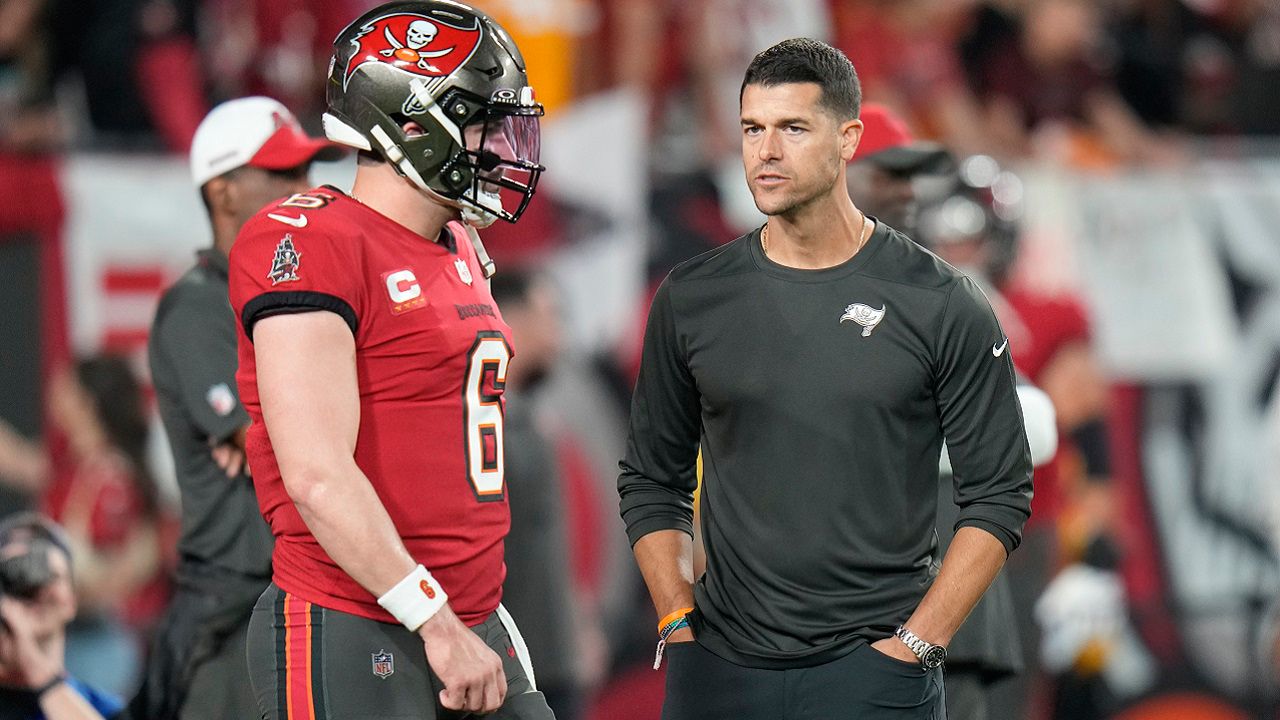 FILE - Tampa Bay Buccaneers quarterback Baker Mayfield (6) talks to offensive coordinator Dave Canales during the first half of an NFL wild-card football game against the Philadelphia Eagles Monday, Jan. 15, 2024, in Tampa, Fla. The Carolina Panthers have agreed to hire Tampa Bay Buccaneers offensive coordinator Dave Canales as their new head coach, according to two people familiar with the situation. (AP Photo/Chris O'Meara, File)