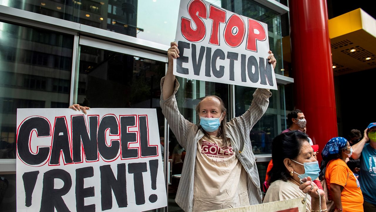 In this Aug. 4 photo, housing advocates protest on the eviction moratorium in New York. (AP/Brittainy Newman)