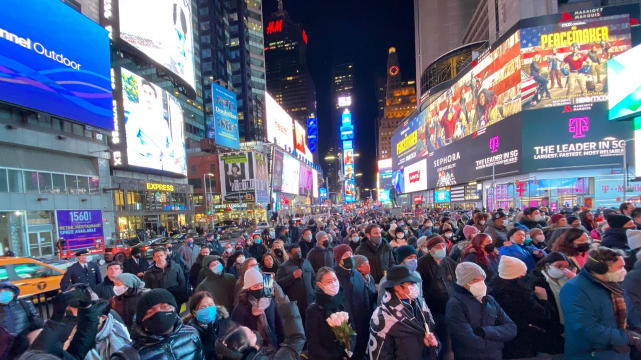 Candlelight vigil for Times Square subway attack victim