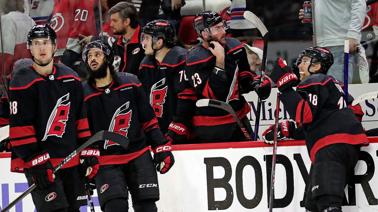 Carolina Hurricanes players react after the New York Rangers scored the winning goal in the overtime period in Game 3 of an NHL hockey Stanley Cup second-round playoff series, Thursday, May 9, 2024, in Raleigh, N.C. (AP Photo/Chris Seward)