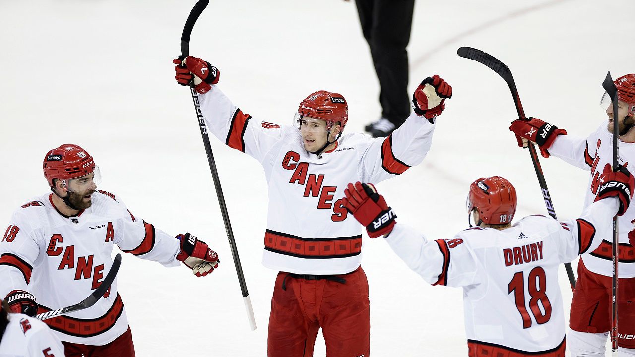 Carolina Hurricanes center Martin Necas (88) celebrates with teammates after scoring an empty-net goal in the third period during Game 5 of an NHL hockey Stanley Cup second-round playoff series against the New York Rangers, Monday, May 13, 2024, in New York. (AP Photo/Adam Hunger)