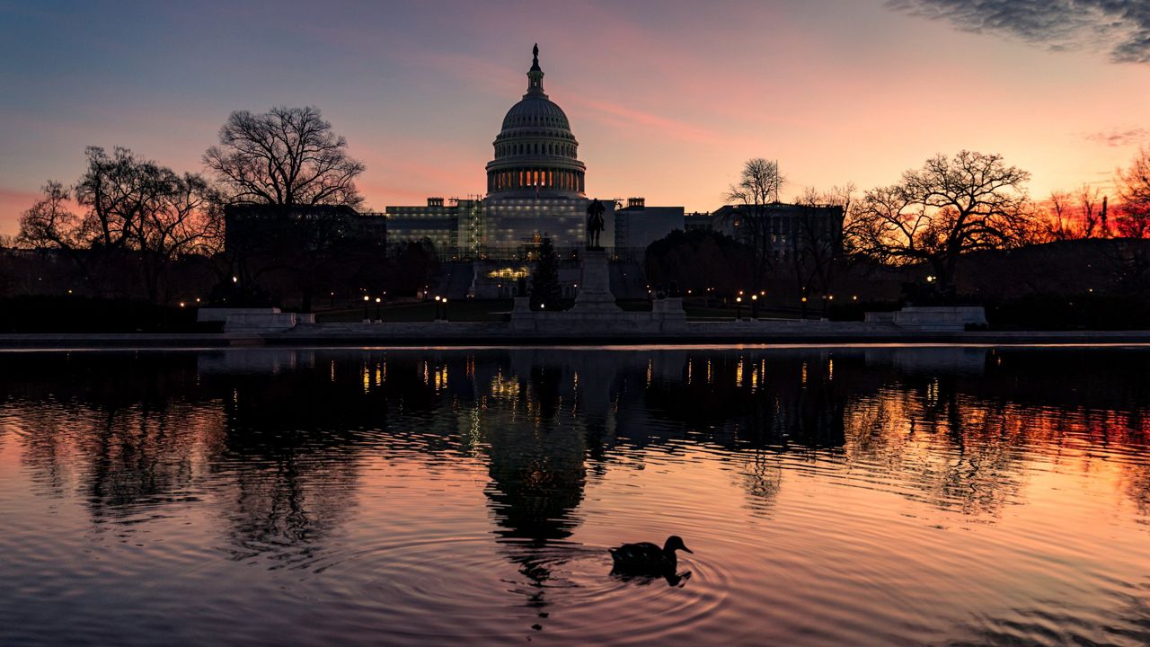 The Capitol is seen in Washington early Wednesday. (AP Photo/J. Scott Applewhite)