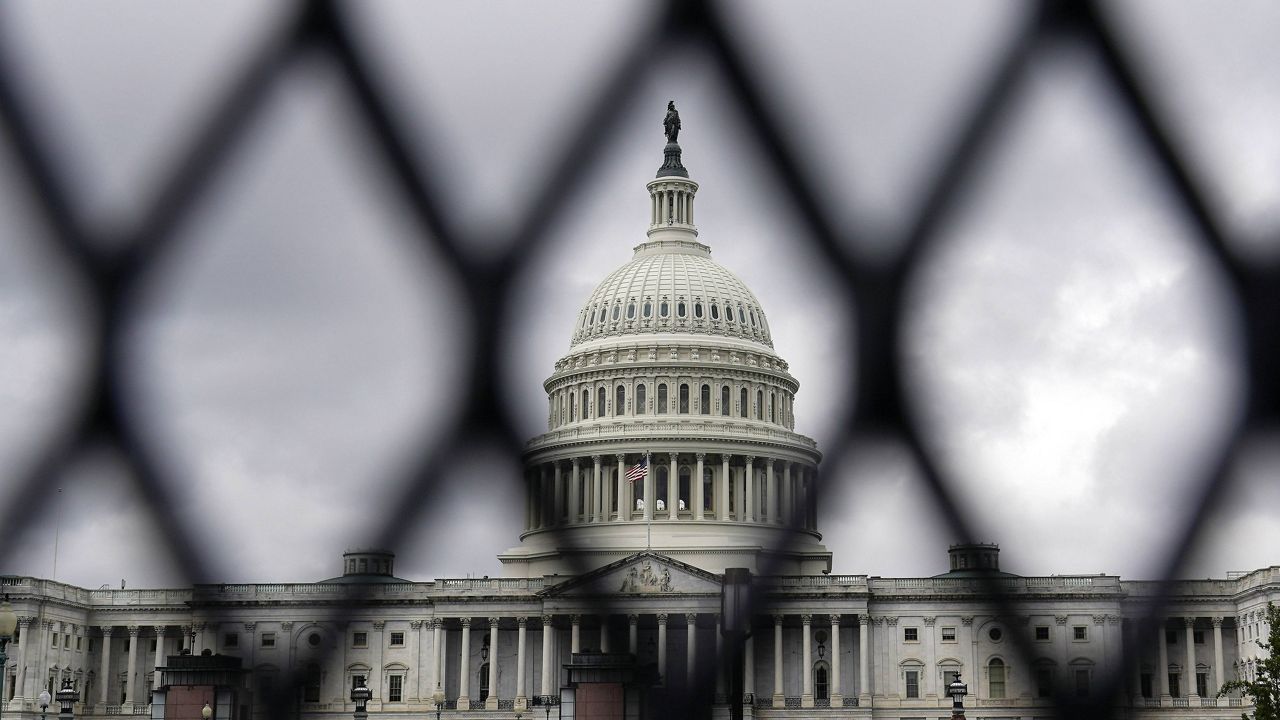 FILE - Security fencing shown around the Capitol in Washington, Sept. 16, 2021. (AP Photo/J. Scott Applewhite, File)