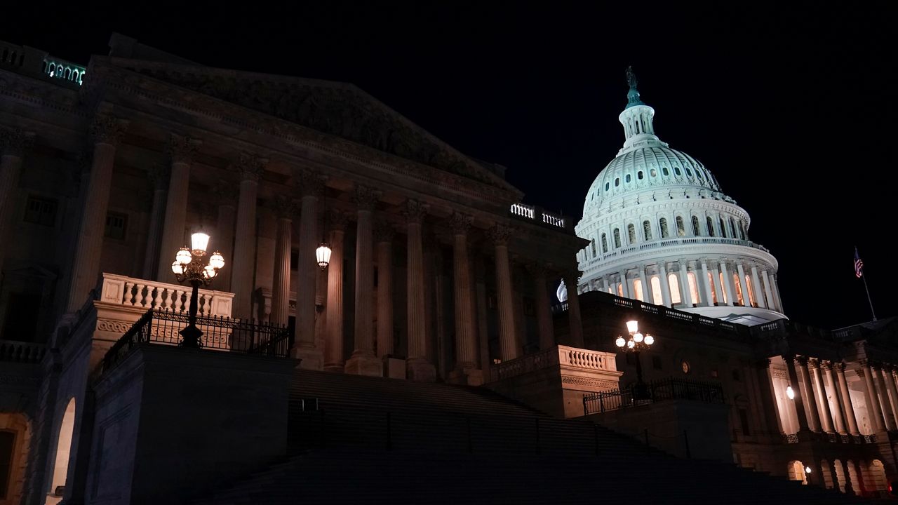 Lights illuminate the Capitol after House Speaker Kevin McCarthy announced that he and President Joe Biden had reached an "agreement in principle" to resolve the looming debt crisis on Saturday, May 27, 2023.