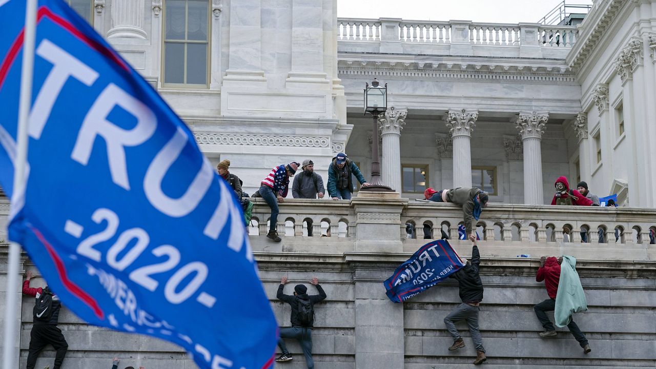 Supporters of former President Donald Trump storm the U.S. Capitol in Washington in this image from Jan. 6, 2021. (Associated Press)