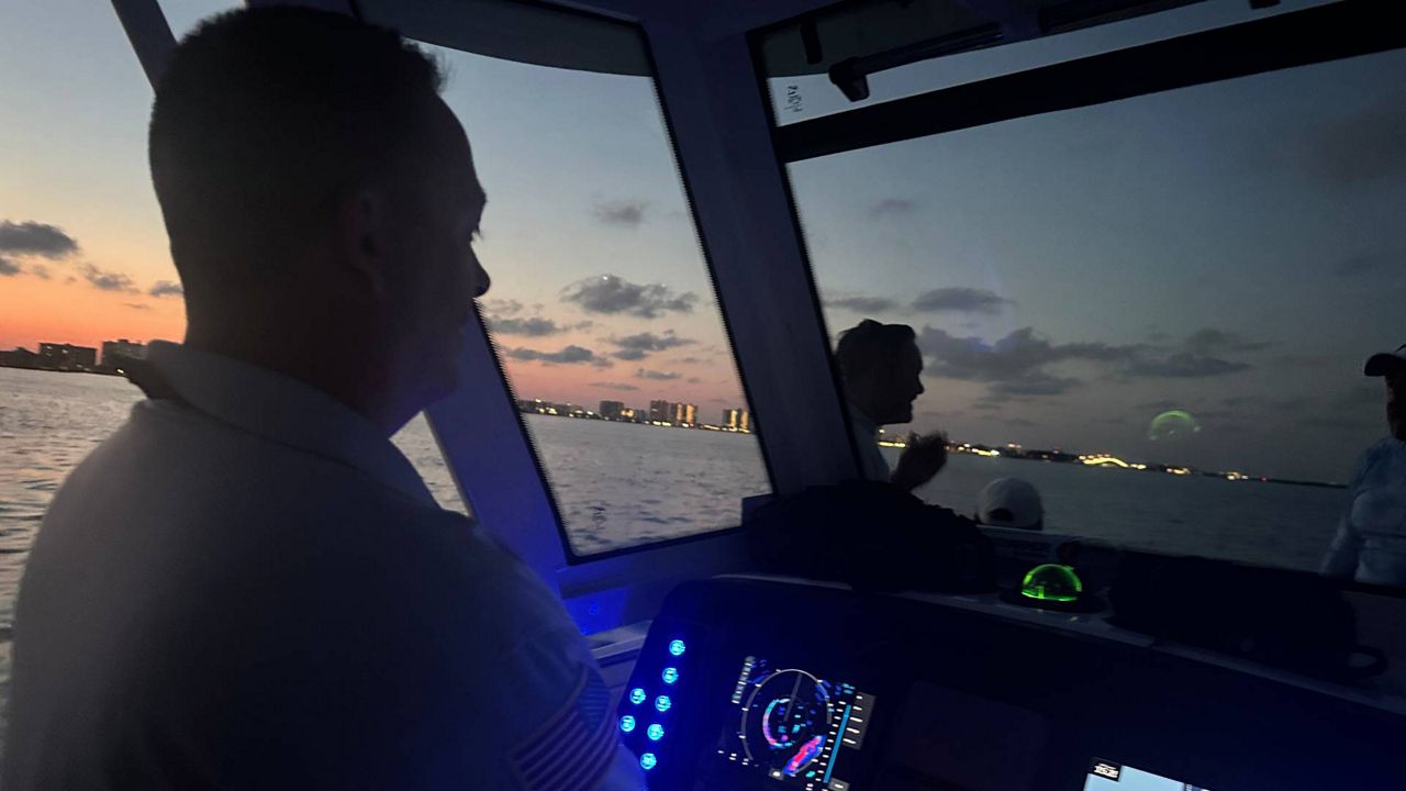 Captain Morgan operates a vessel during a nighttime training session for a Pinellas County couple. (Spectrum News/Eugene Buenaventura)