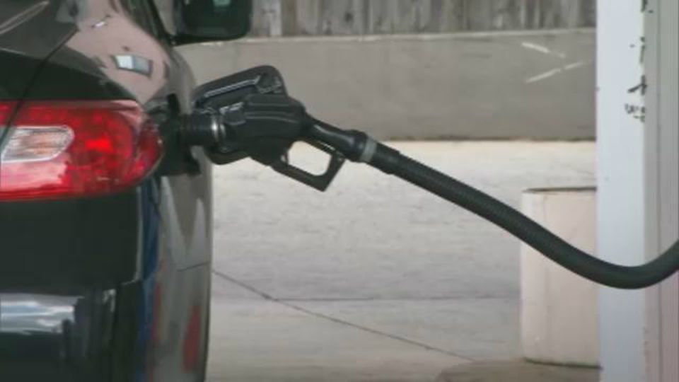 Car at gas pump (Spectrum News file photograph)