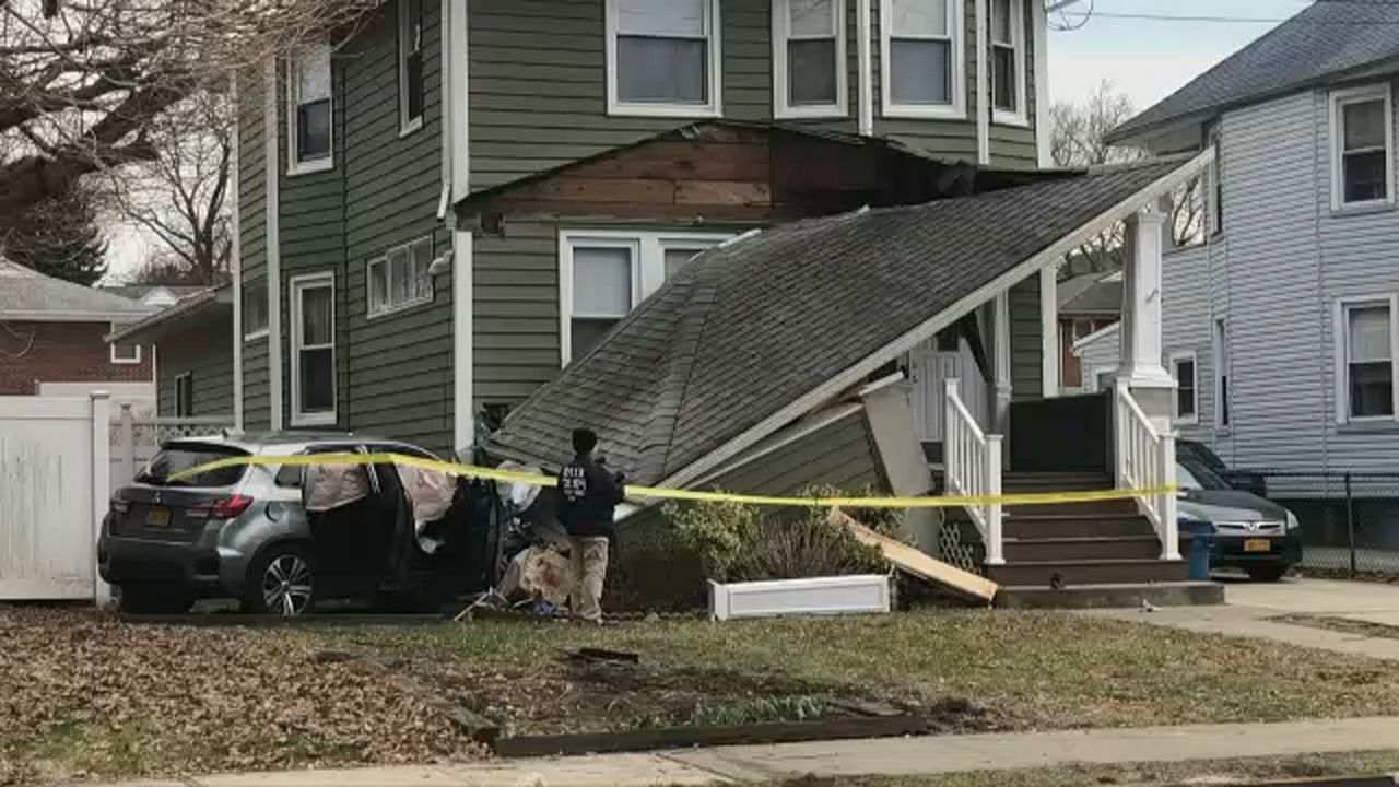 Woman killed after boyfriend drives off with her on the hood of his car