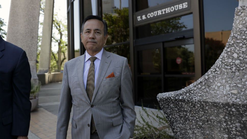 Texas Sen. Carlos Uresti, D-San Antonio. right, leaves the federal courthouse for a hearing, Monday, July 10, 2017, in San Antonio. (AP Photo/Eric Gay)