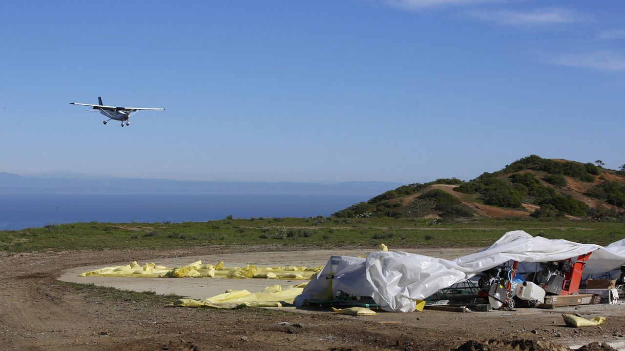 A small plane lands on Catalina's Airport in the Sky as the U.S. Marines and Navy Seabees rebuild the mountaintop runway on storied Santa Catalina Island, Calif., Friday, Jan. 25, 2019. (AP Photo/Damian Dovarganes, File)