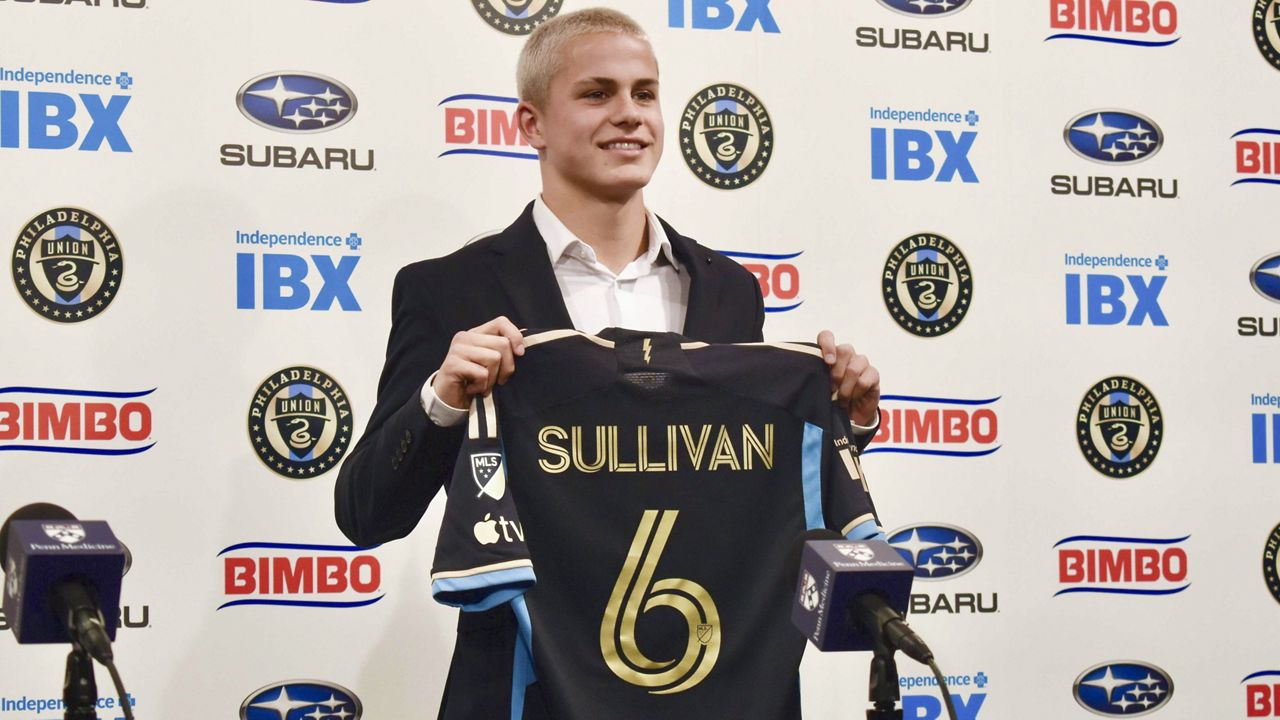 Philadelphia Union player Cavan Sullivan, 14, holds up his No. 6 jersey during an MLS soccer news conference at Subaru Park in Chester, Pa., May 9, 2024. (Jonathan Tannenwald/The Philadelphia Inquirer via AP, File)