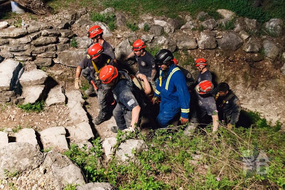 First responders getting the teen out of the cave. (Credit: SAFD Facebook)