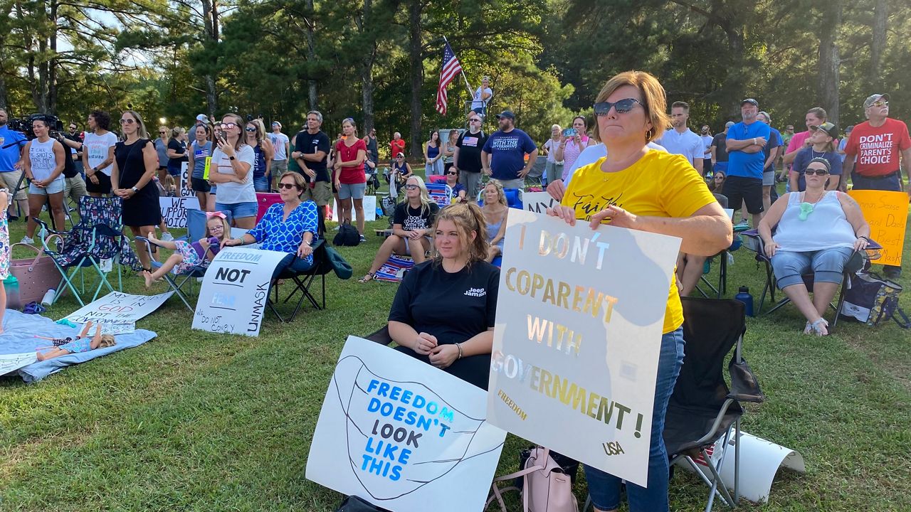 Rep. Madison Cawthorn, from western North Carolina, led protests in Smithfield Tuesday over mask mandates in Johnston County schools. 