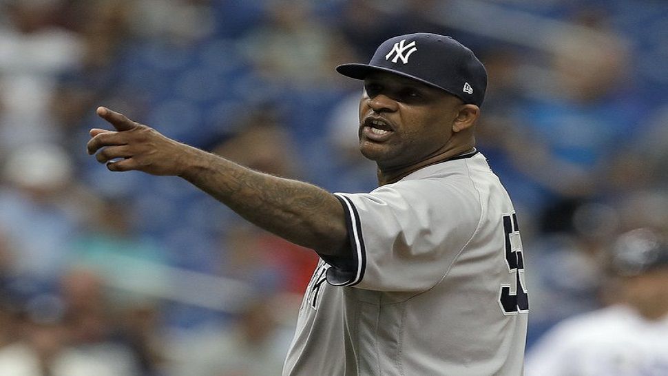 Sabathia ejected as Yankees rout Rays, 12-1