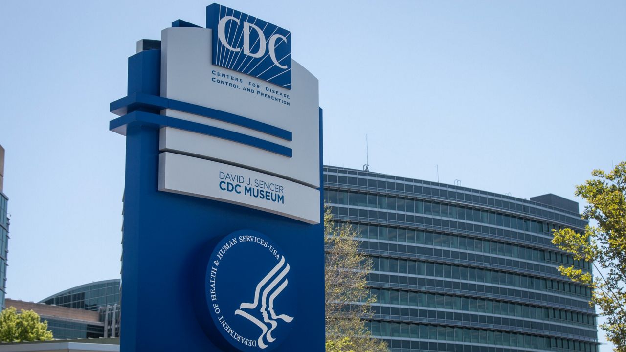 A CDC sign stands at the entrance of the agency's offices in Atlanta. (AP Photo/Ron Harris, File)