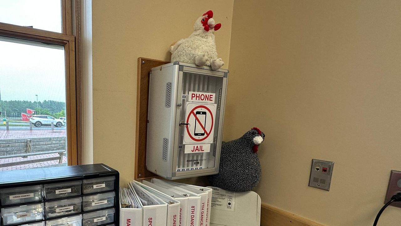 The “phone jail” inside the Cony High School office is where cellphones go when they become a problem at the school. (Spectrum News/Susan Cover)