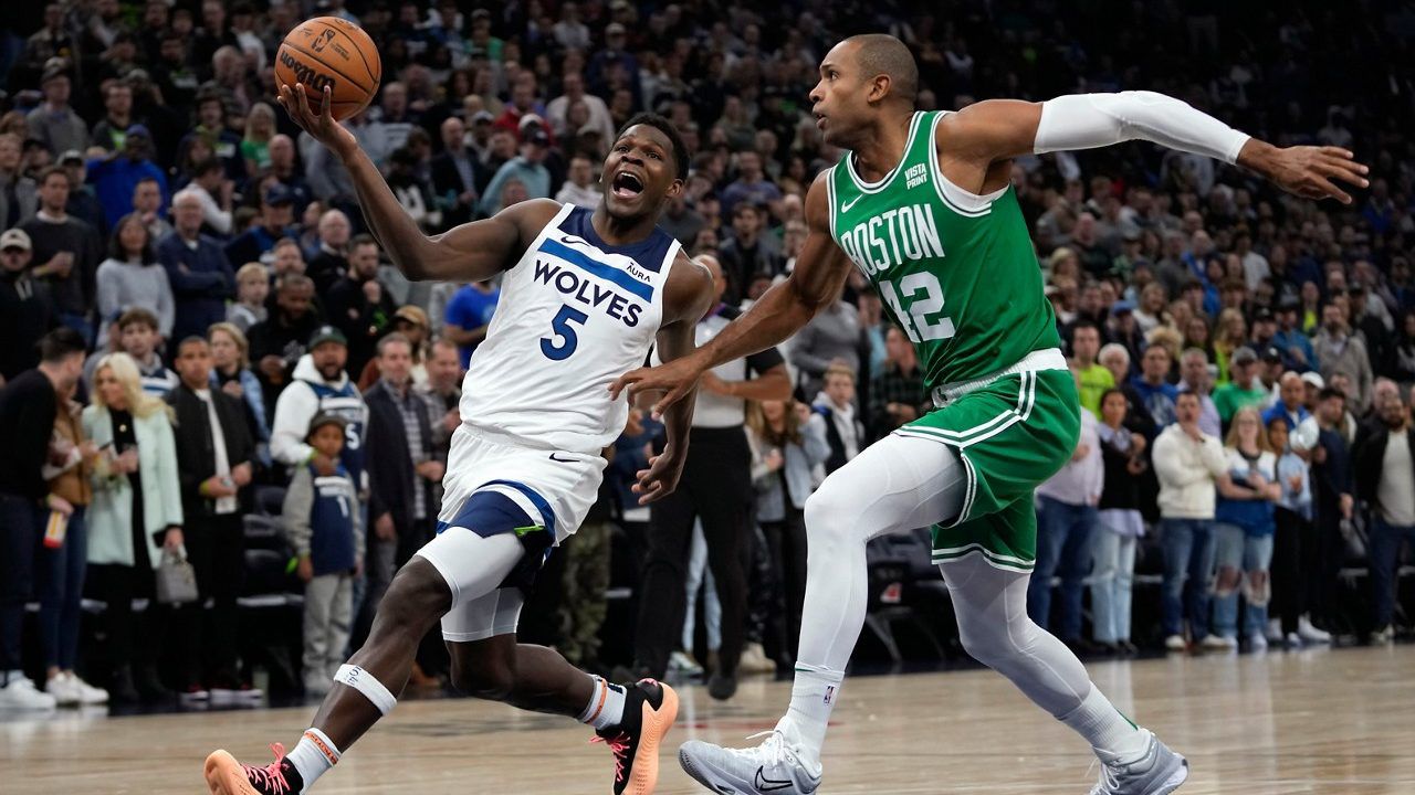 Wolves hand Celtics 1st loss with 114-109 OT victory