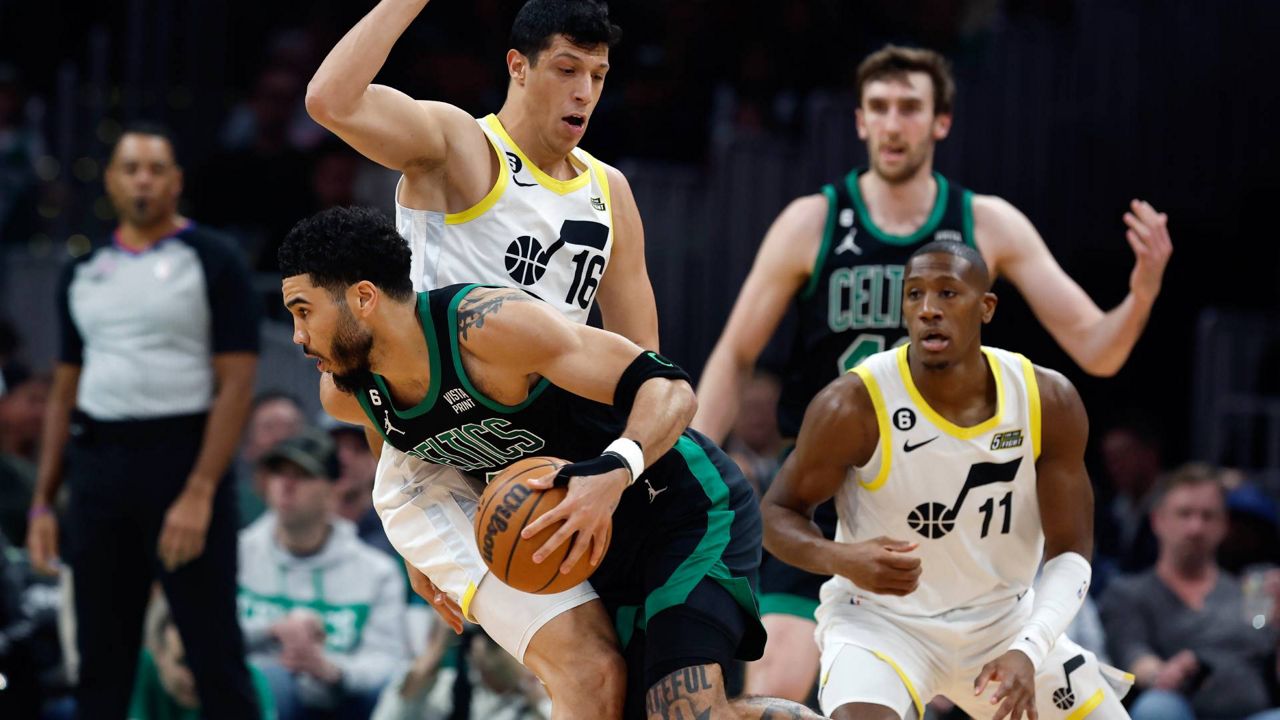 Tatums 39 lifts Celtics over short-handed Jazz 122-114