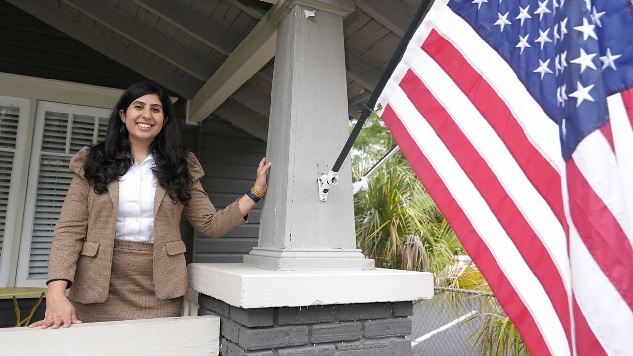 Florida state Rep. Anna Eskamani poses out front of her office Wednesday, March 27, 2024, in Orlando, Fla. (AP Photo/John Raoux)