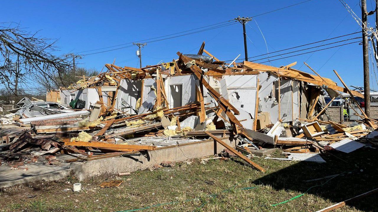 A home located in Round Rock, Texas, is destroyed following a probable tornado in this image from March 22, 2022. (Spectrum News 1/Charlotte Scott)
