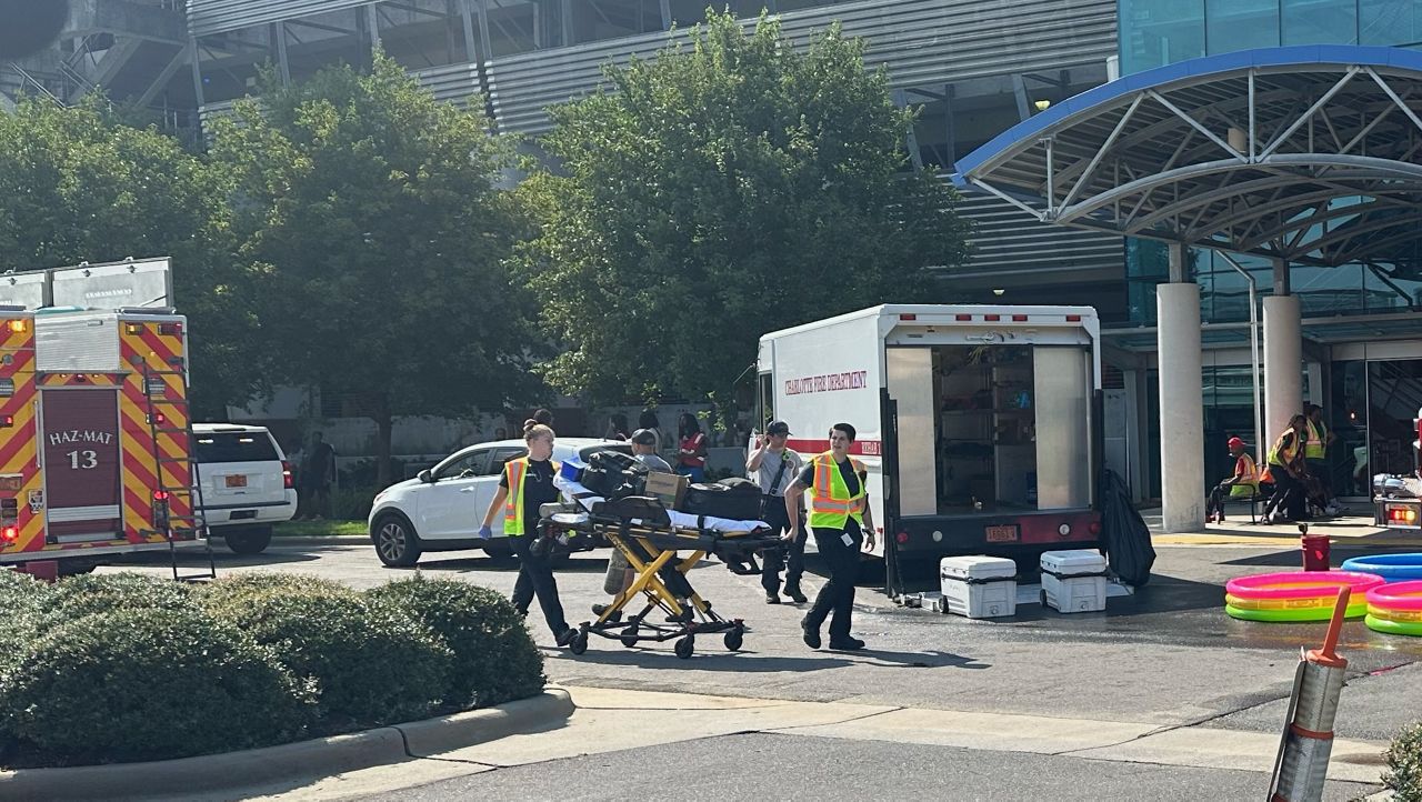 Three people suffered minor injuries in a fire Saturday morning at a Charlotte Douglas International Airport parking deck, and paramedics transported one for further evaluation. (Spectrum News 1)