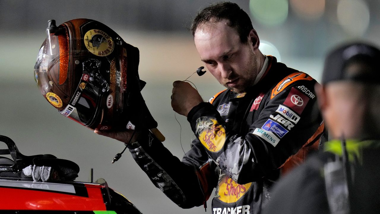 Chase Briscoe takes off his helmet after his qualifying run for the NASCAR Daytona 500 auto race Wednesday, Feb. 12, 2025, in Daytona Beach, Fla. (AP Photo/Chris O'Meara)