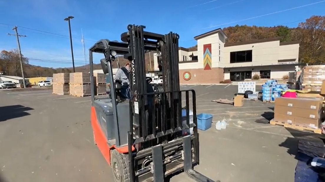 The Eastern Band of Cherokee Indians have been using one of their warehouses to help distribute supplies to communities in the mountains hard hit by Helene. (Spectrum News 1/Dwayne White)