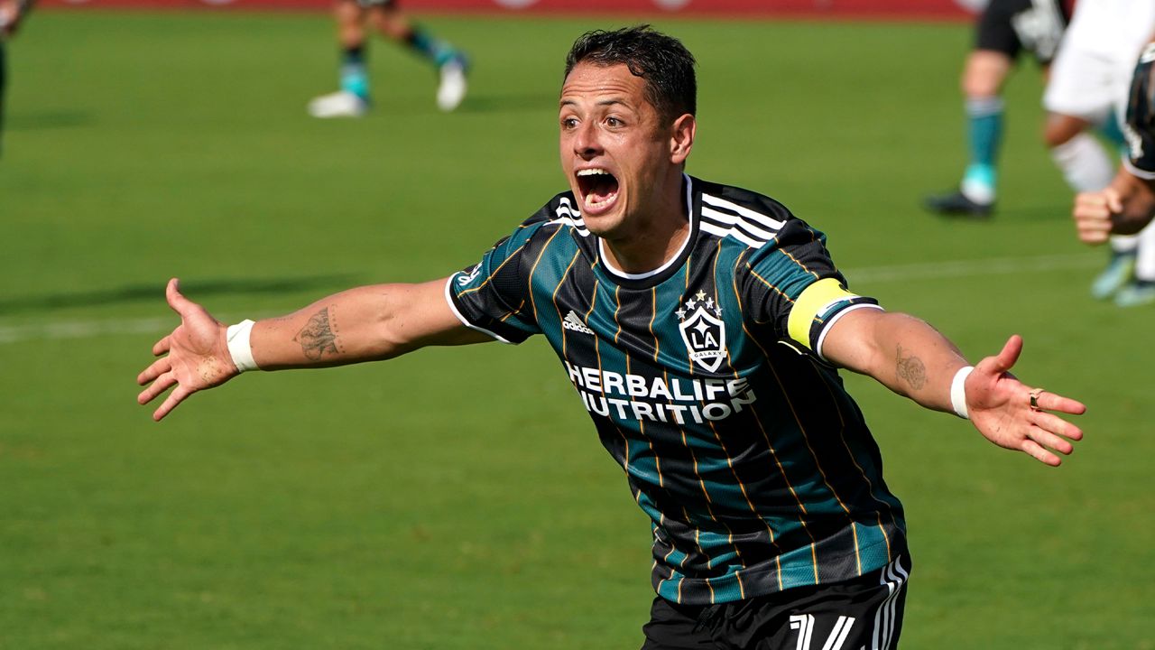 LA Galaxy forward Javier Hernandez (14) reacts after scoring a goal during the second half of an MLS soccer match against Inter Miami, Sunday, April 18, 2021, in Fort Lauderdale, Fla. (AP Photo/Lynne Sladky)