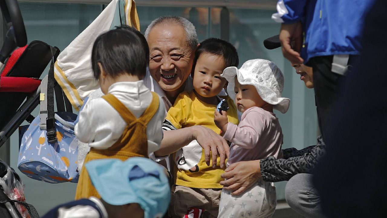China easing birth limits further to cope with aging society(00)