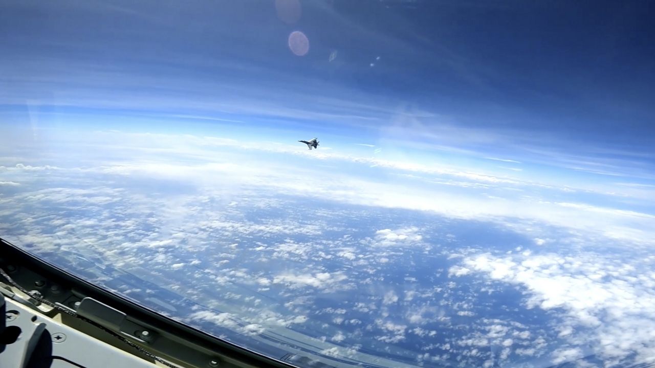 In this image from video provided by the U.S. Navy, a Chinese J-16 fighter on Friday flies aggressively close to a U.S. RC-135 aircraft in international airspace over the South China Sea. (U.S. Navy via AP, File) 