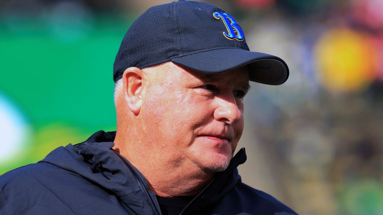 UCLA head coach Chip Kelly watches warmups before an NCAA college football game against Oregon Saturday, Oct. 22, 2022, in Eugene, Ore. (AP Photo/Chris Pietsch, File)