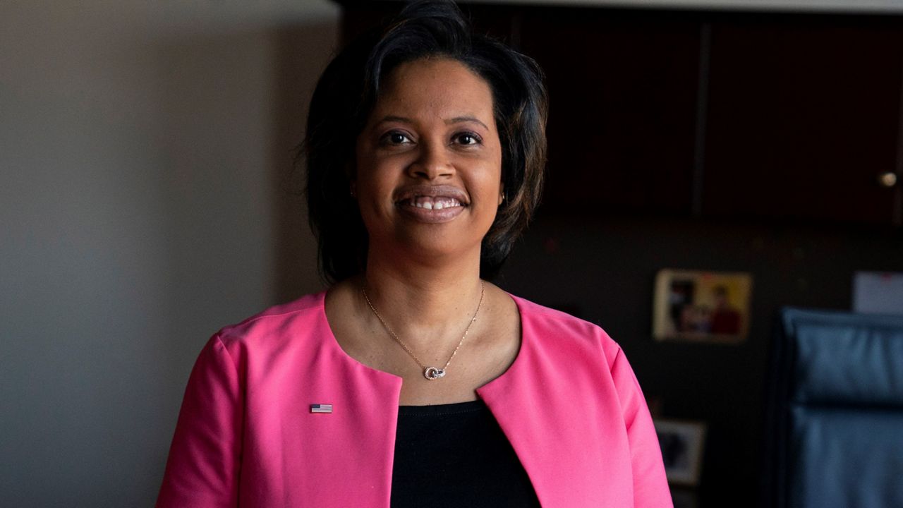 Chiquita Brooks-LaSure, the Administrator for the Centers of Medicare and Medicaid Services, poses for a photograph in her office, Feb. 9, 2022, in Washington. (AP Photo/Evan Vucci, File)