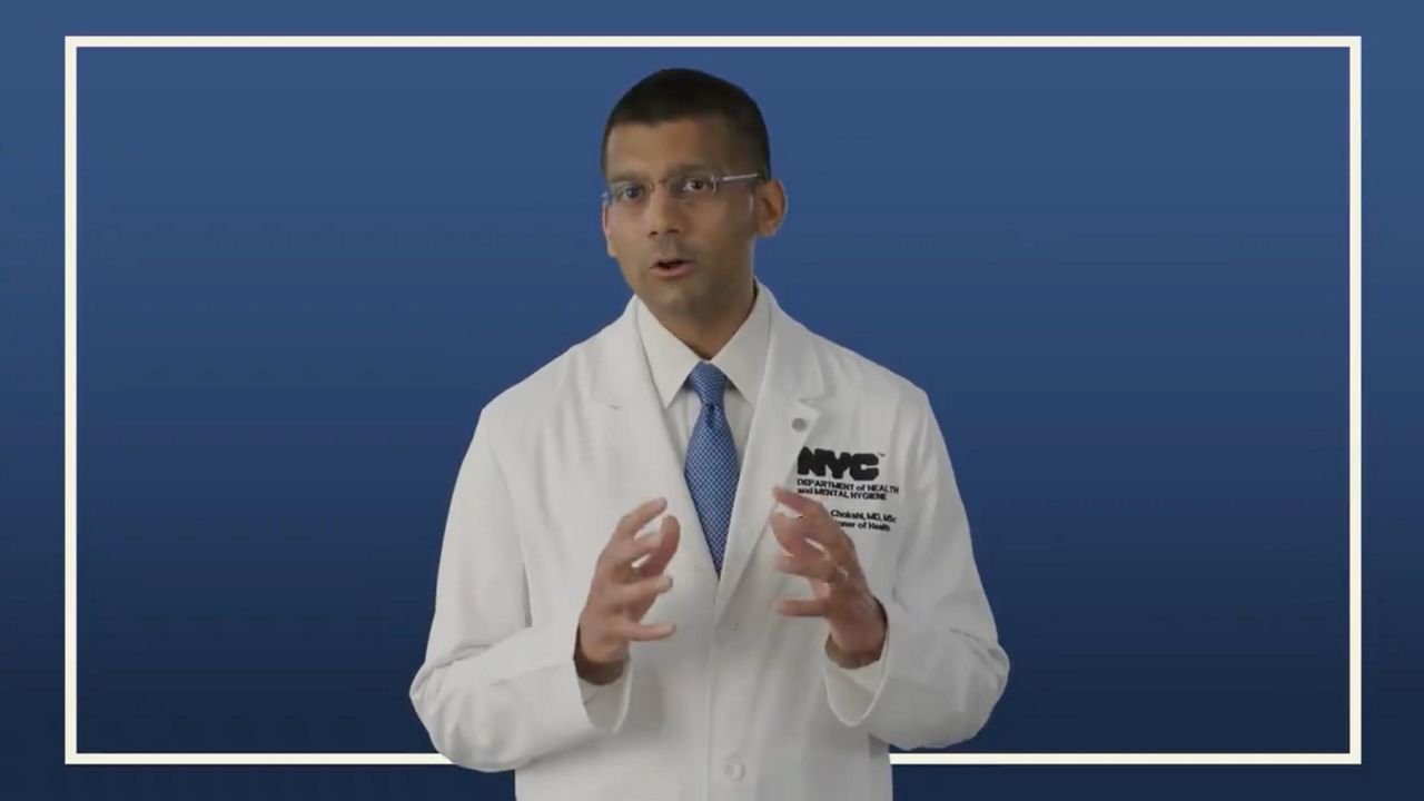 Dr. Dave Chokshi, the city's health commissioner, in an advertisement for COVID-19 vaccines. 