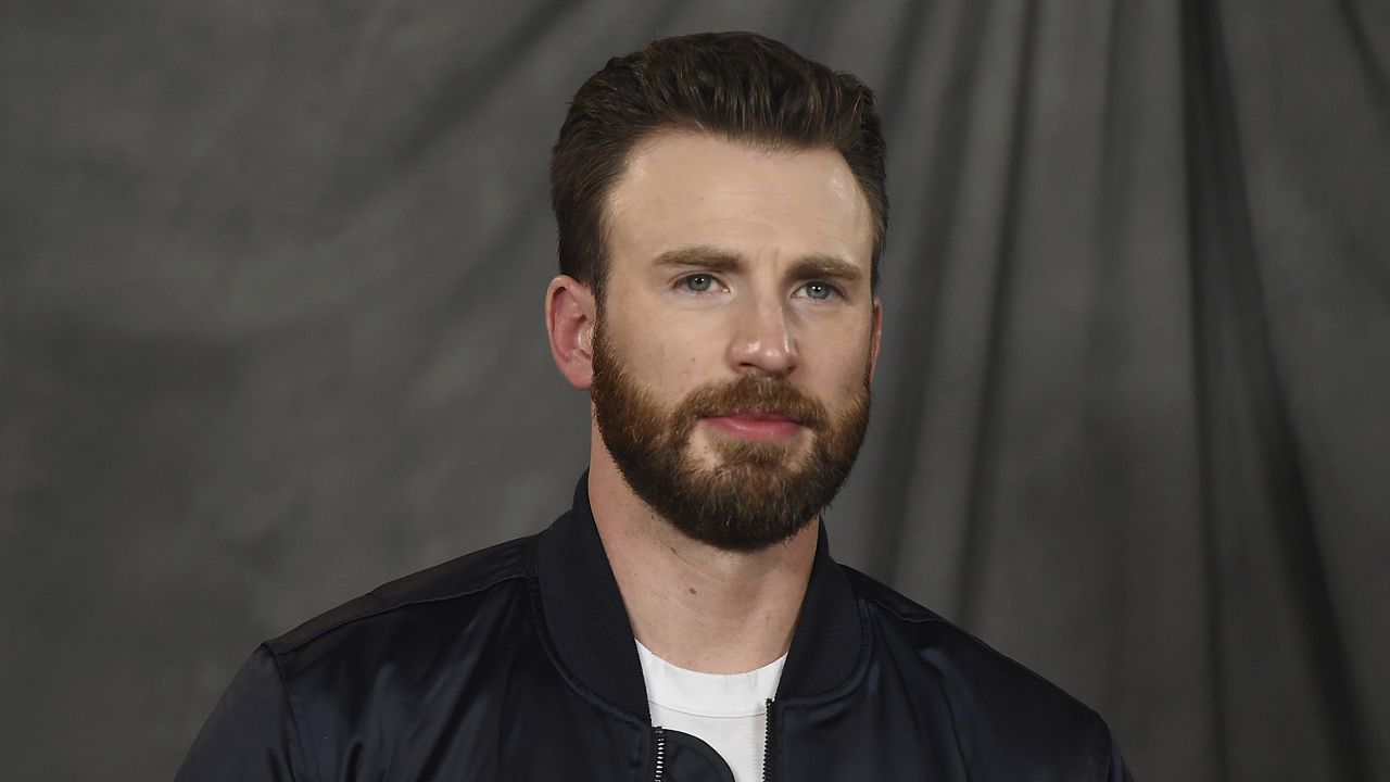 FILE - Chris Evans attends the "Knives Out" photo call at the Four Seasons Hotel on Friday, Nov. 15, 2019, in Los Angeles. (Photo by Jordan Strauss/Invision/AP)