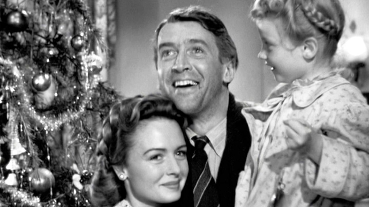 The movie "It's a Wonderful Life", produced and directed by Frank Capra. Seen here from left, Donna Reed as Mary Hatch Bailey, James Stewart as George Bailey and Karolyn Grimes as Zuzu.