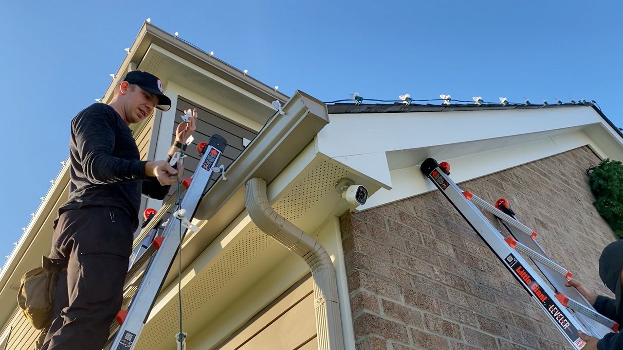 Lights aglow as organization grows for mild installers