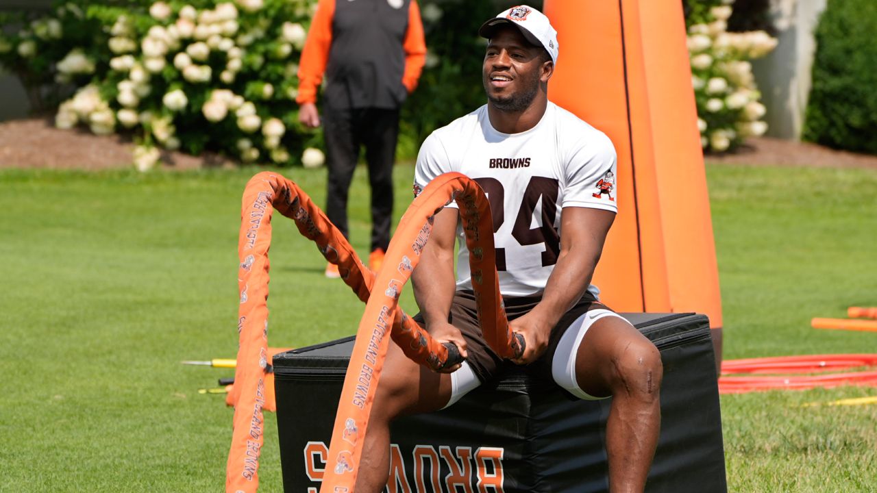 Cleveland Browns running back Nick Chubb (24) works out during an NFL football training camp practice Friday, July 26, 2024, in in White Sulphur Springs, W.Va. Chubb is recovering from a season-ending knee injury that required two surgeries. 