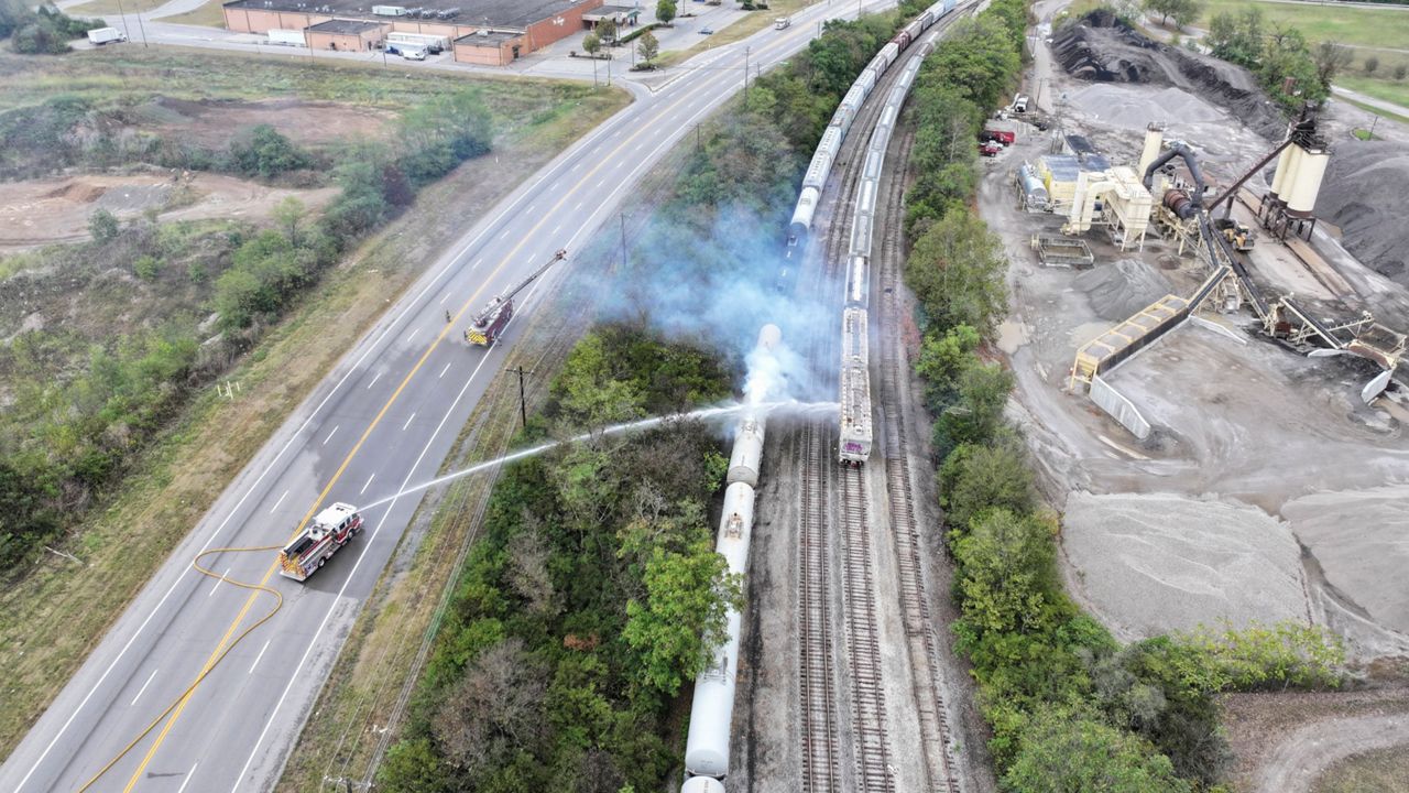 A sheriff's vehicle blocks a road closure at U.S. Route 50 and Ohio State Route 128 in Whitewater Township near Cleves, Ohio, due to chemical leak from a railcar Tuesday, Sept. 24, 2024. (Frank Bowen IV/The Cincinnati Enquirer via AP)