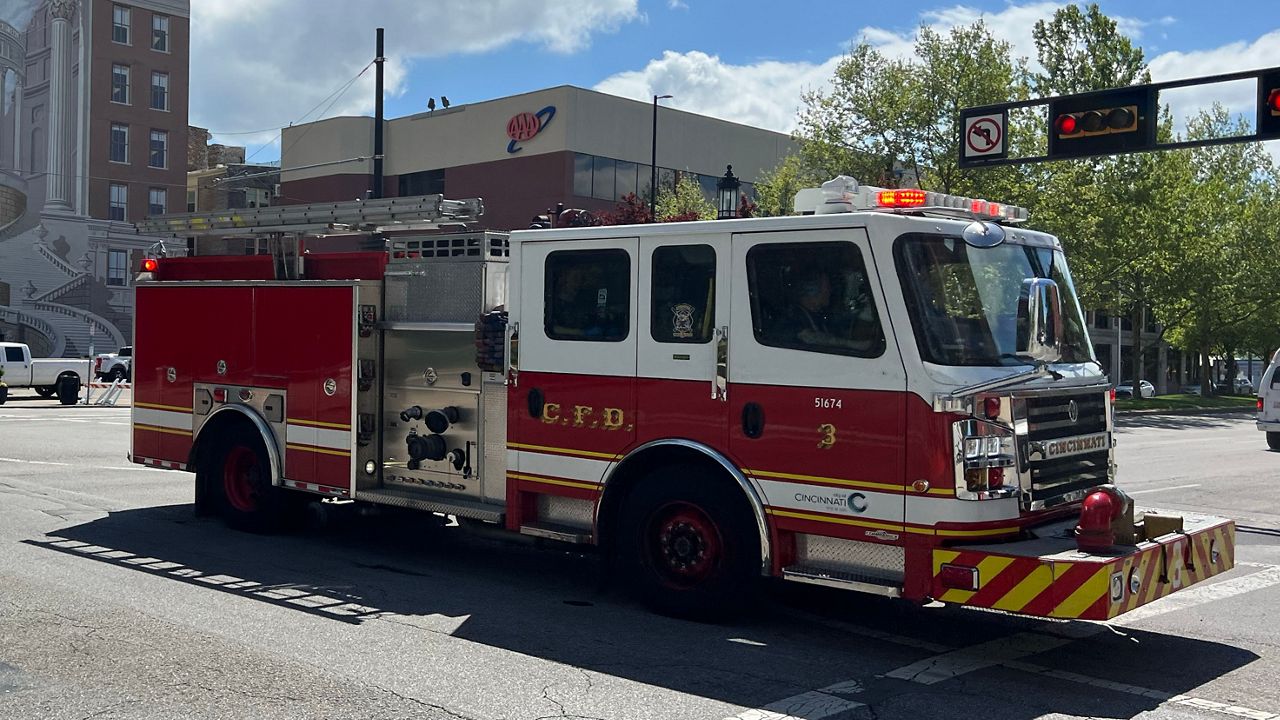 A Cincinnati Fire Department firetruck responding to a call on Vine Street in Cincinnati, Ohio on Wednesday, April 24, 2024. 