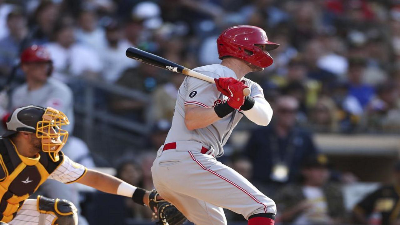 Kyle Farmer of the Cincinnati Reds bats against the San Francisco