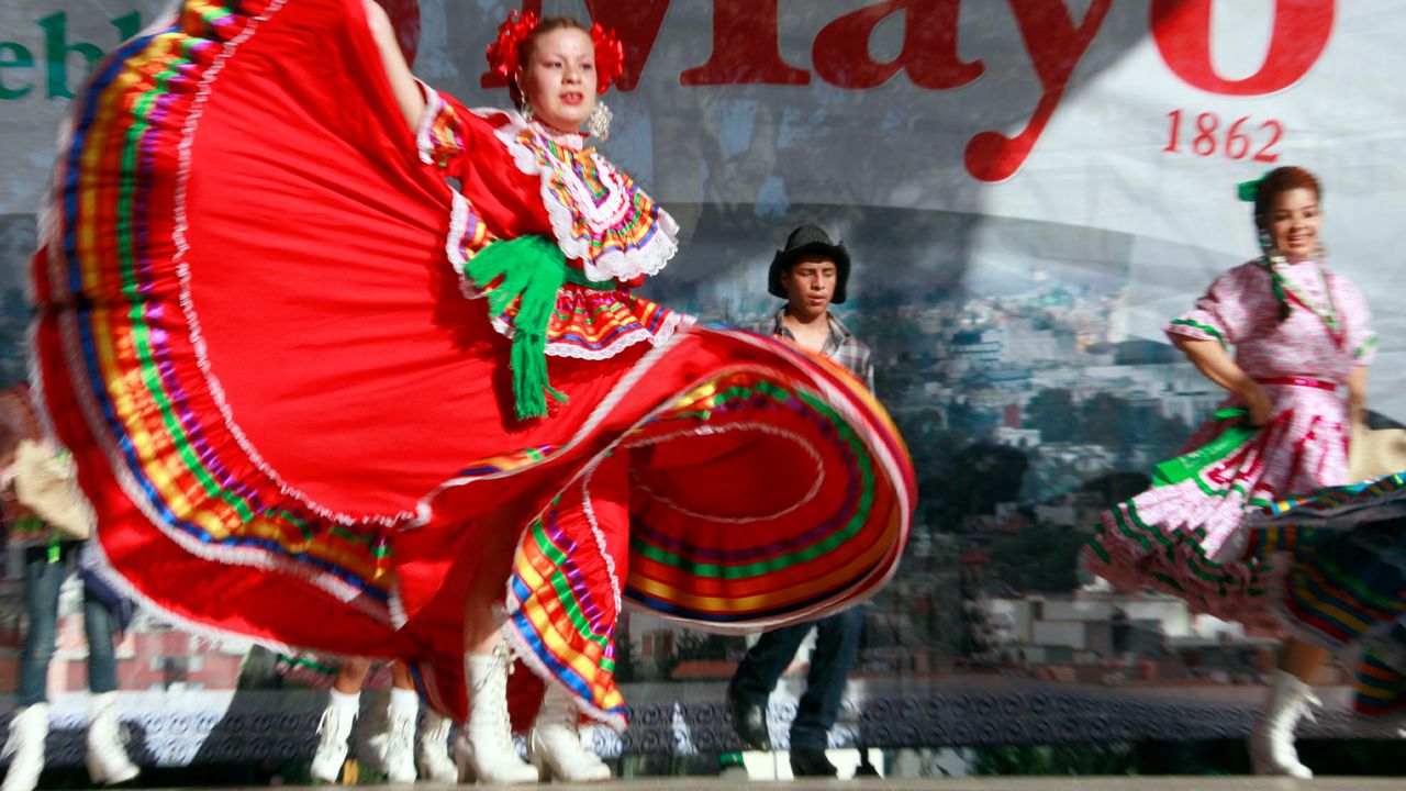 A Mexican dancer performs at a Cinco de Mayo celebration.
